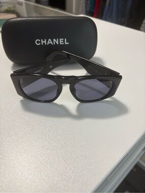 Chanel Black Oval Sunglasses with Dark Blue Lenses